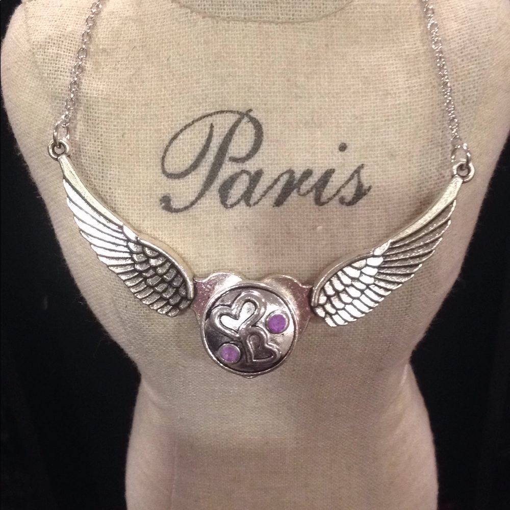 Angel wings with double heart insert